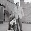 Disneyland Sleeping Beauty Castle photo with Audie Murphy and family, 1956