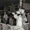 Audie Murphy and son at Disneyland Frontierland Shooting Gallery, 1956