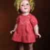 Shirley Temple 1930s 18 inch composition doll wearing Curly Top Daisy Dress