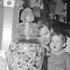 Audie Murphy and son at Disneyland Market House, 1956