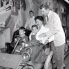 Mr. Toad's Wild Ride at Disneyland with Audie Murphy and family, 1956