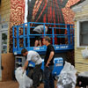 Shepard Fairey and crew painting a mural in South Park neighborhood of San Diego, July 15, 2010