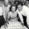 Shirley Temple celebrating her 21st birthday on the set of The Story of Seabiscuit, 1949 with Barry Fitzgerald, Director David Butler, and John Agar