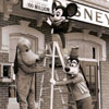 Mickey Mouse, Pluto, Goofy hang the 100 millionth guest sign at Disneyland