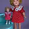 Composition Shirley Temple 16 inch Baby Take A Bow doll with Danbury Mint miniature porcelain doll