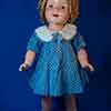 Shirley Temple 22 inch composition doll wearing Bright Eyes loop dress