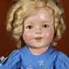 Shirley Temple 1930s 13 inch composition doll wearing Curly Top Daisy Dress