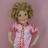 Shirley Temple doll wearing Curly Top Pink Sleeper Danbury Mint Portrait Doll Outfit