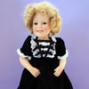 Danbury Mint Shirley Temple doll by Elke Hutchens wearing Ideal Heidi dress photo
