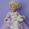 Danbury Mint Shirley Temple porcelain doll wearing outfit from Heidi