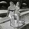 Mari Blanchard and Lori Wilson at Hollywood Roosevelt Hotel pool, 1953