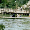 Walt Disney and Lillian Disney paddling a canoe on the Rivers of America