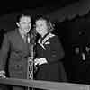 Announcer George Fisher and Shirley Temple at the premiere of Rebecca of Sunnybrook Farm, 1938