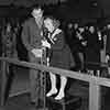 Announcer George Fisher and Shirley Temple at the premiere of Rebecca of Sunnybrook Farm, 1938