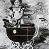 Shirley Temple at her Rockingham home with baby doll and carriage